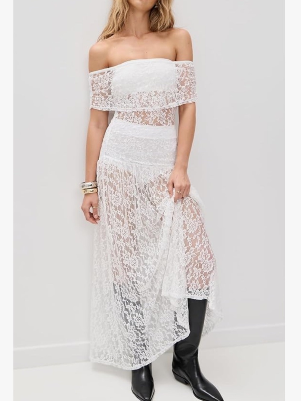 Sheer off-shoulder lace maxi. Layered bodice with fitted waist. Romantic floral